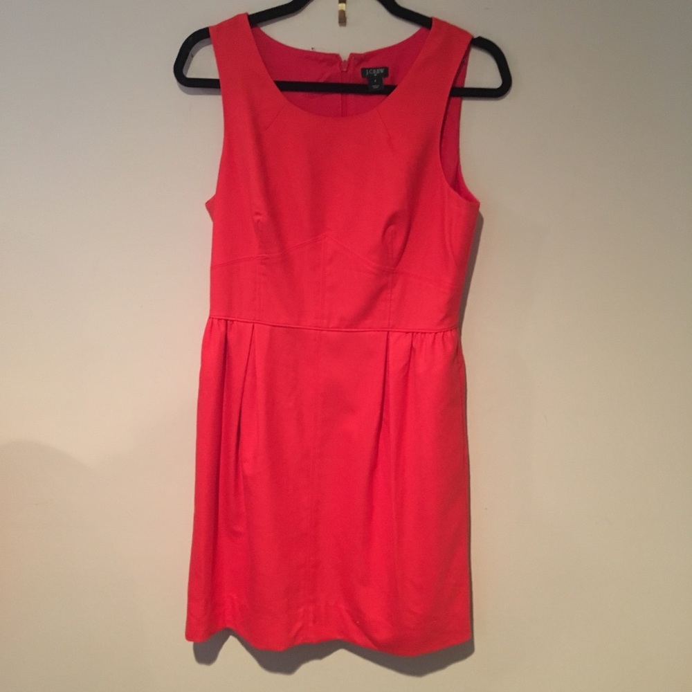 Sleeveless reddish/orange cocktail dress